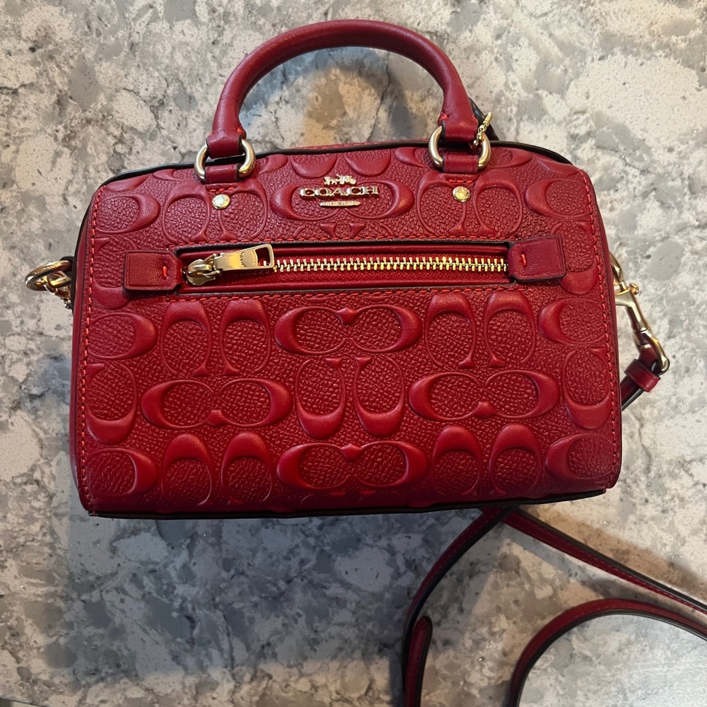 Small red coach bag